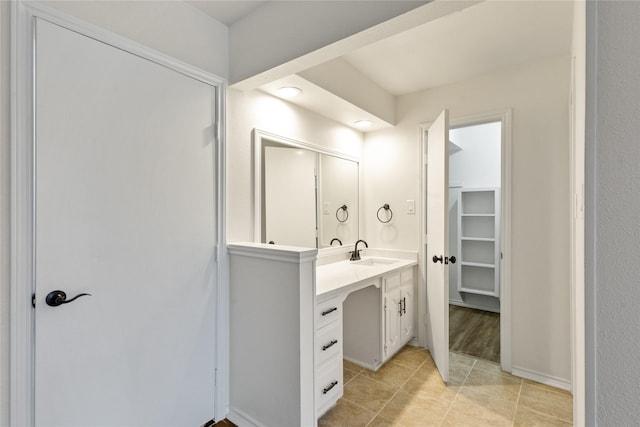 bathroom featuring vanity and tile patterned flooring