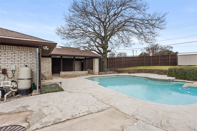 view of swimming pool featuring a patio area