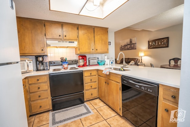 kitchen featuring tasteful backsplash, white appliances, light tile patterned floors, sink, and kitchen peninsula