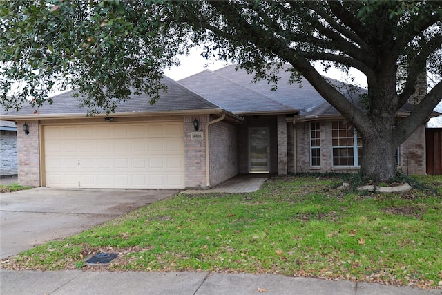 ranch-style house with a front lawn and a garage