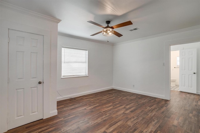 unfurnished bedroom with ceiling fan, crown molding, and dark hardwood / wood-style flooring