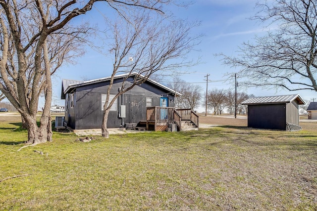 view of yard featuring central AC