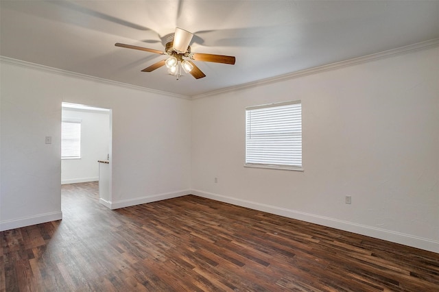 unfurnished room featuring ceiling fan, crown molding, and dark hardwood / wood-style flooring