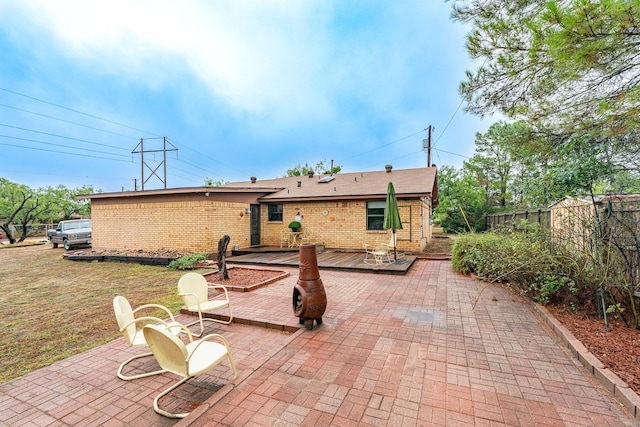 back of house featuring a patio area