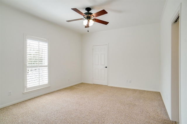 1306 Lexington Sq, Southlake, TX 76092 - spare room with light carpet, ceiling fan, and baseboards
