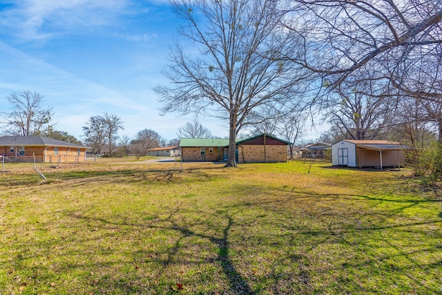 view of yard with a storage shed