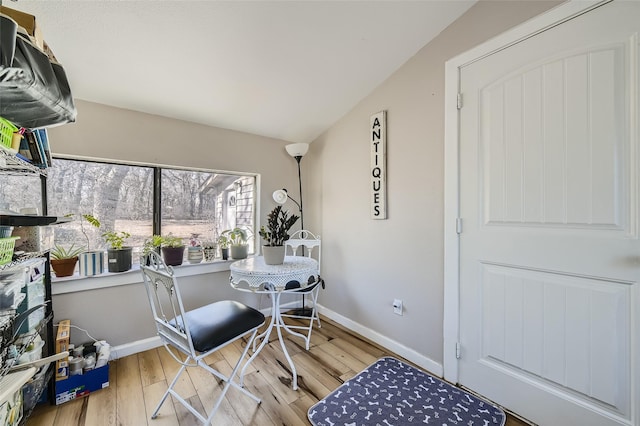 dining space with light wood-type flooring