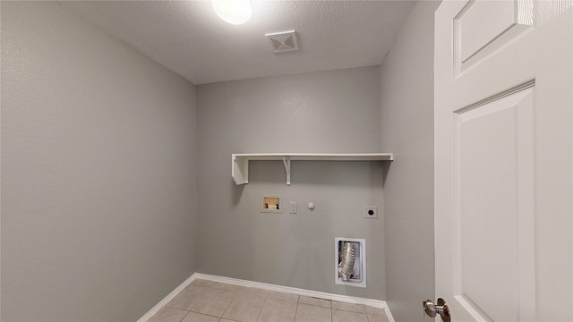 clothes washing area with laundry area, baseboards, hookup for a gas dryer, hookup for a washing machine, and hookup for an electric dryer