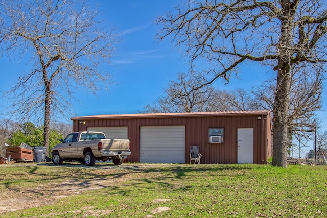 garage with a lawn