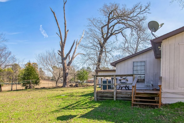 view of yard with a wooden deck