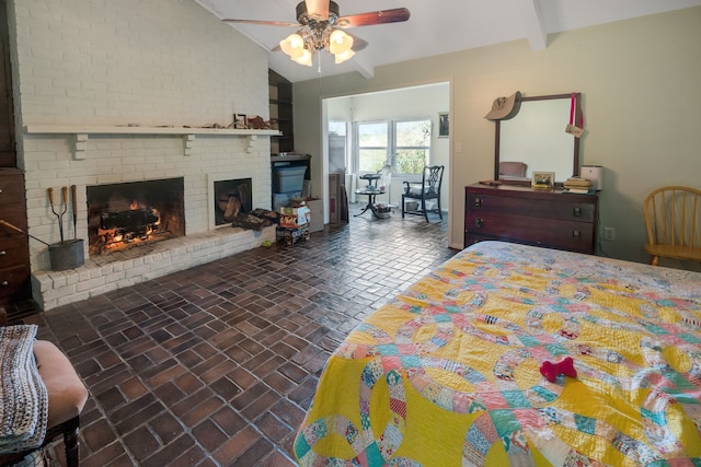 bedroom with a fireplace, ceiling fan, and lofted ceiling with beams