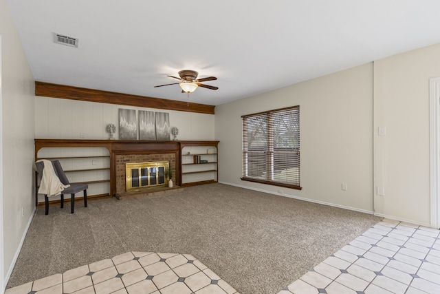 unfurnished living room with ceiling fan, light carpet, and a brick fireplace