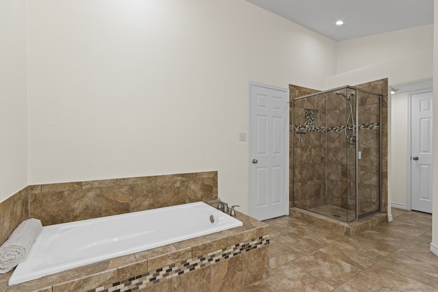 bathroom with independent shower and bath