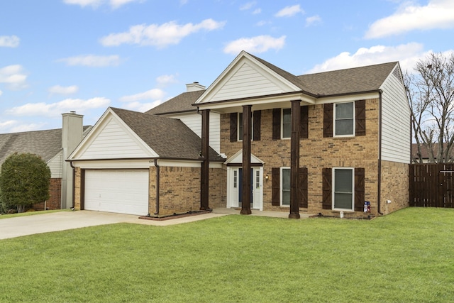 view of front of home with a front lawn and a garage