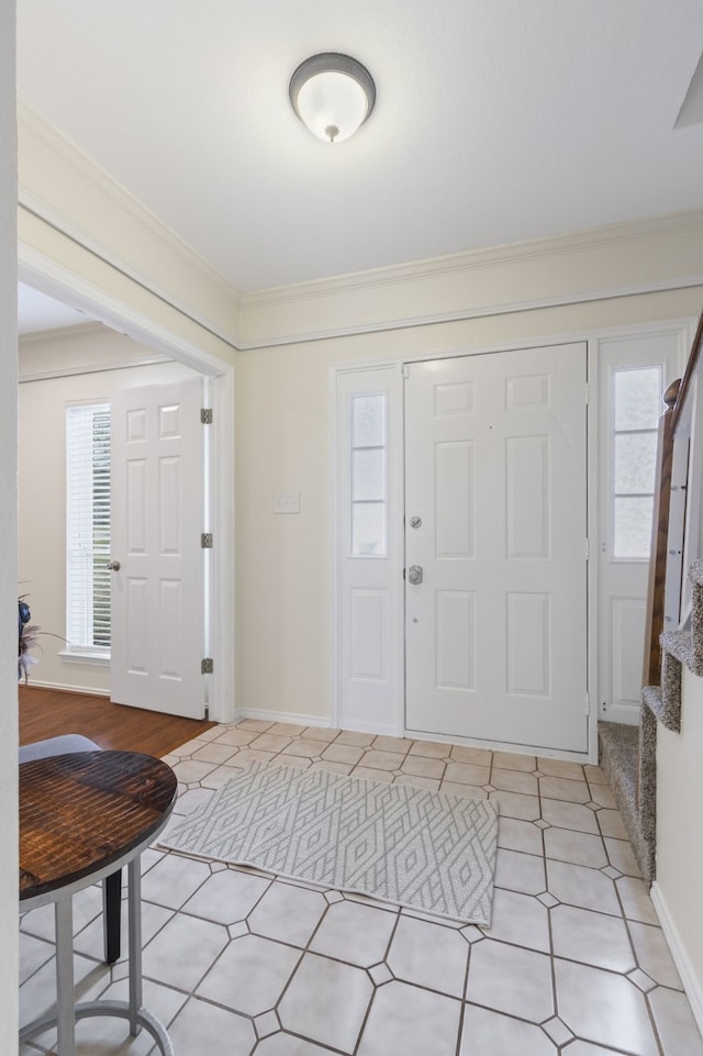 foyer entrance with ornamental molding