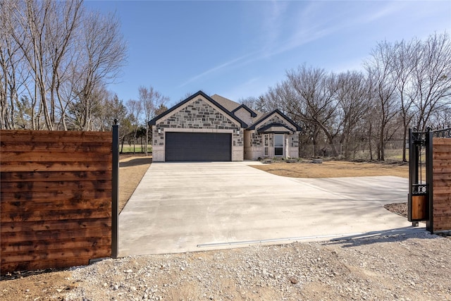 view of front of property with a garage