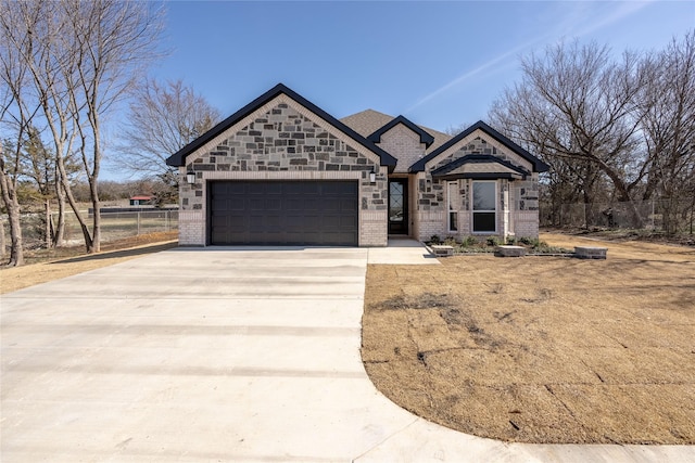 view of front of property with a garage