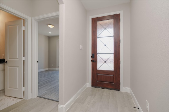 doorway featuring light hardwood / wood-style flooring