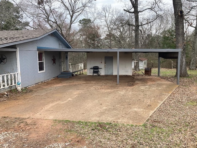 view of front of house with an attached carport