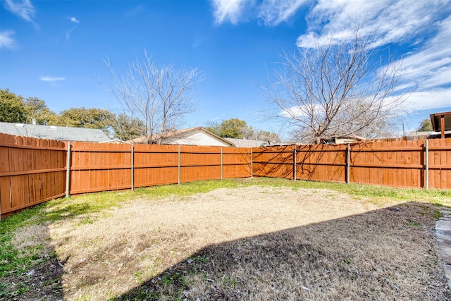 view of yard featuring a fenced backyard