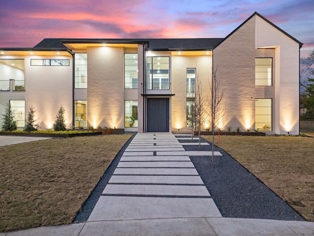 modern home with a yard