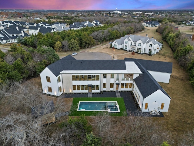 view of aerial view at dusk