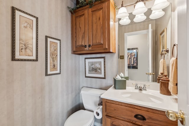 958 Heritage Creek Dr, Rhome, TX 76078 - bathroom with toilet, vanity, and wallpapered walls