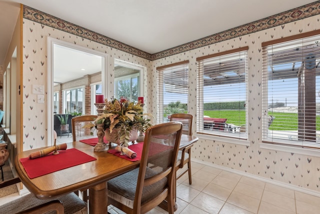 958 Heritage Creek Dr, Rhome, TX 76078 - dining area featuring light tile patterned floors, baseboards, and wallpapered walls