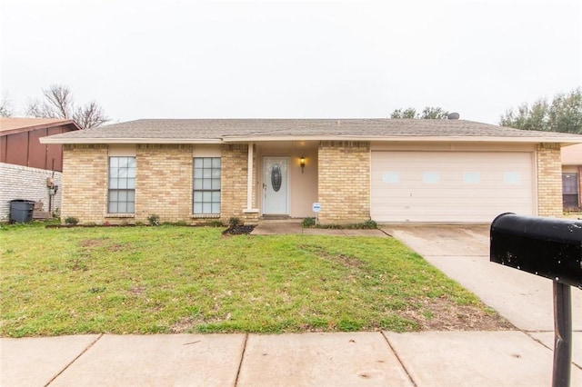 ranch-style home with a garage and a front lawn