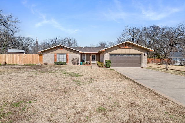 single story home featuring a garage and a front yard