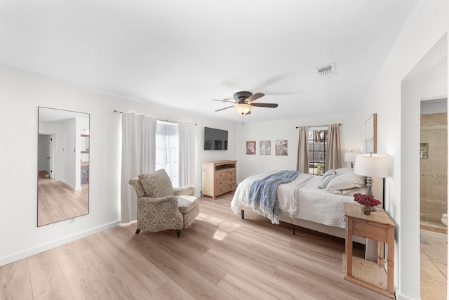 bedroom with connected bathroom, ceiling fan, and light hardwood / wood-style flooring