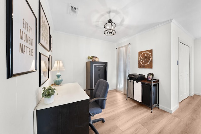 office featuring light wood-type flooring, a chandelier, and ornamental molding