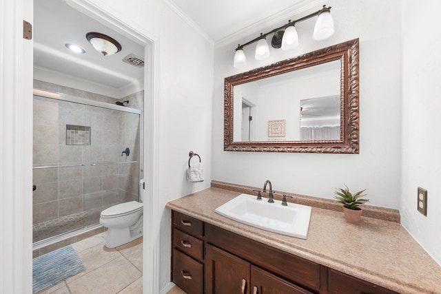 bathroom featuring ornamental molding, toilet, vanity, and an enclosed shower