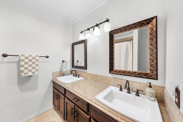 bathroom with vanity, crown molding, and tile patterned floors