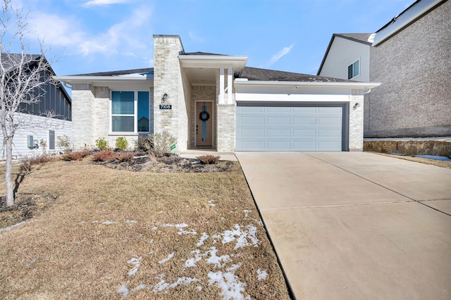 view of front of property with a garage