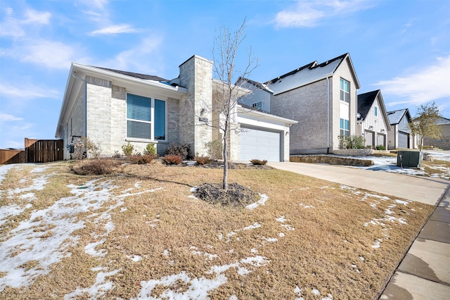 view of front of property featuring a garage