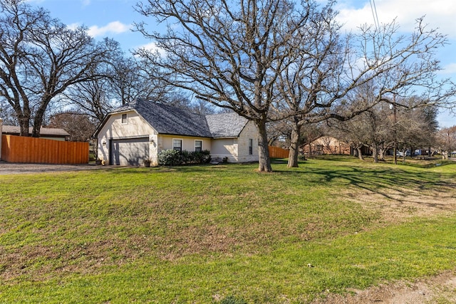 view of yard featuring a garage