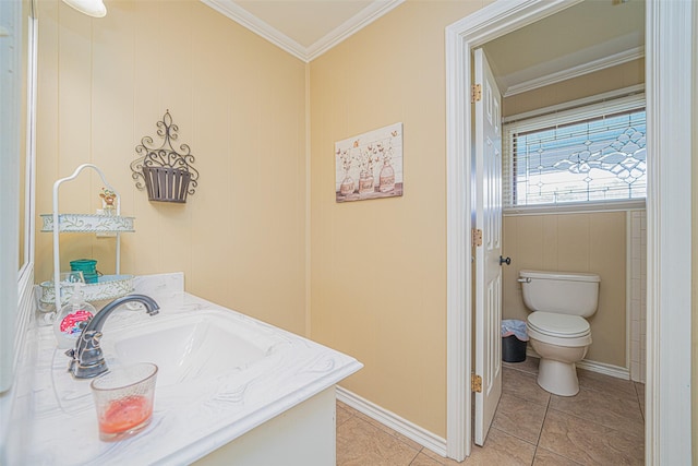 bathroom featuring ornamental molding, vanity, tile patterned flooring, and toilet