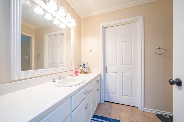 bathroom with ornamental molding, vanity, and tile patterned flooring