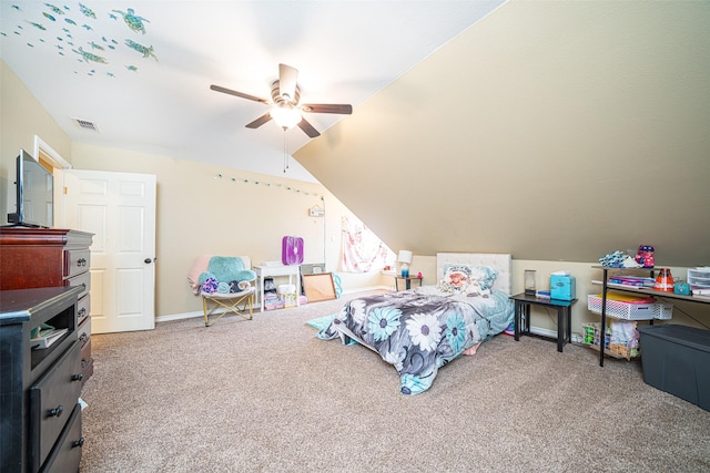 bedroom with carpet, vaulted ceiling, and ceiling fan