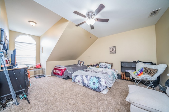 bedroom featuring lofted ceiling, ceiling fan, and carpet flooring