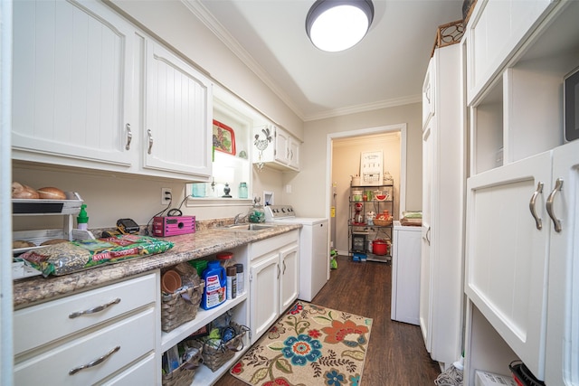 kitchen with white cabinetry, crown molding, dark hardwood / wood-style flooring, and light stone countertops