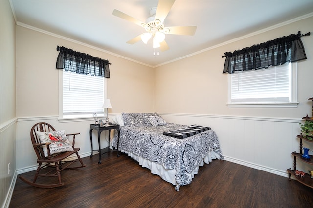 bedroom with ceiling fan, crown molding, and dark hardwood / wood-style floors