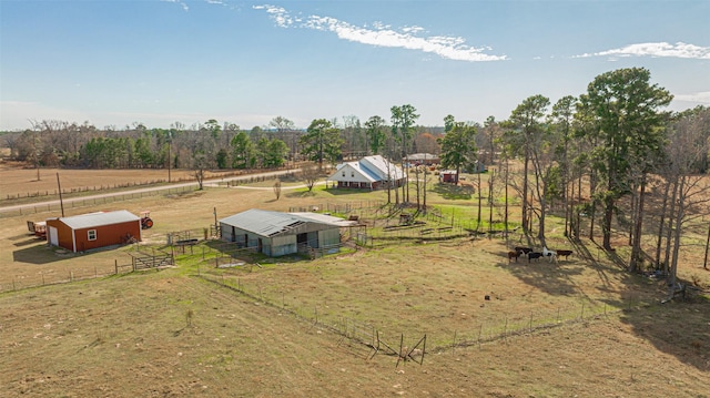 birds eye view of property featuring a rural view