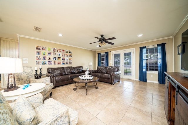 tiled living room with ceiling fan, ornamental molding, and french doors