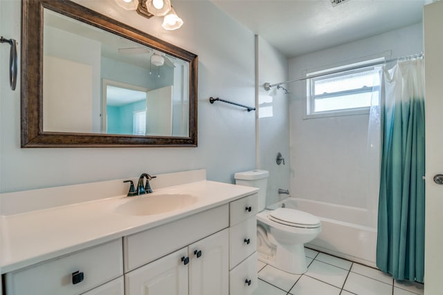 full bathroom featuring tile patterned floors, toilet, vanity, and shower / tub combo