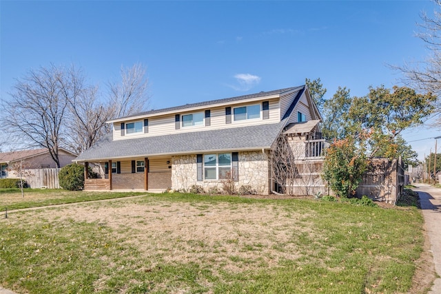 view of front of home with a front yard