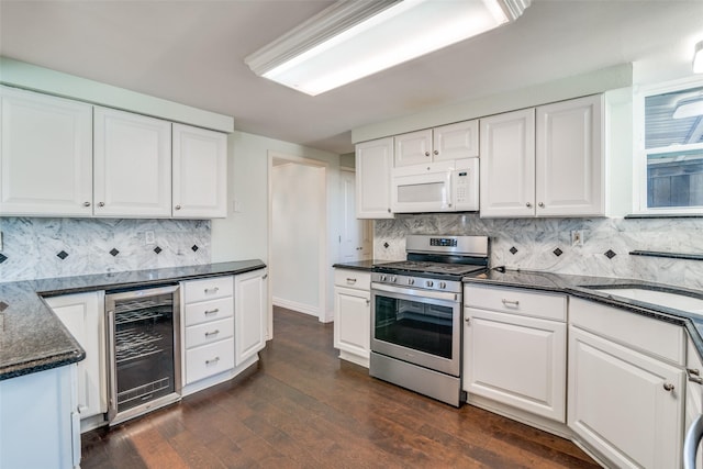 kitchen with gas stove, white cabinets, and wine cooler