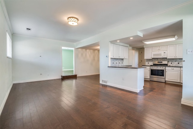 kitchen featuring white cabinets, stainless steel stove, dark hardwood / wood-style flooring, and tasteful backsplash