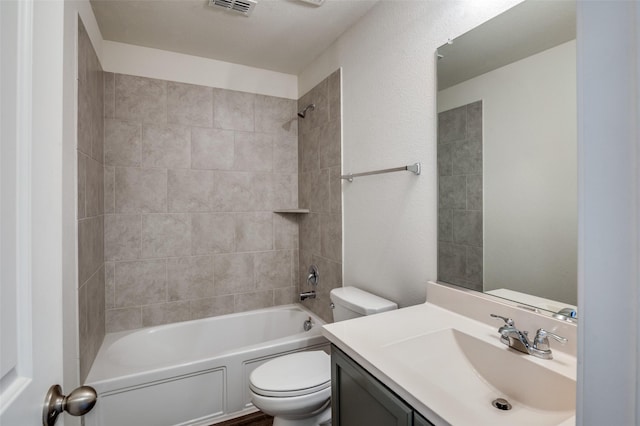 bathroom with shower / bath combination, visible vents, toilet, and vanity